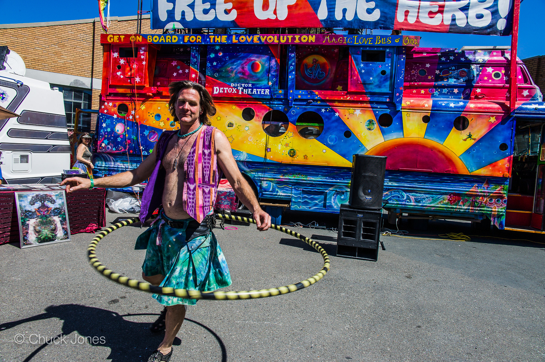 Hula hooper in front of the Magic Love Bus at the Deep Green Festival, Craneway Pavilion, Richmond, April 2012